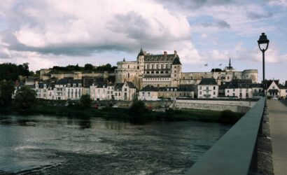 A river running through a city next to a bridge