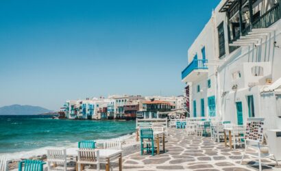 white and brown concrete buildings near sea during daytime
