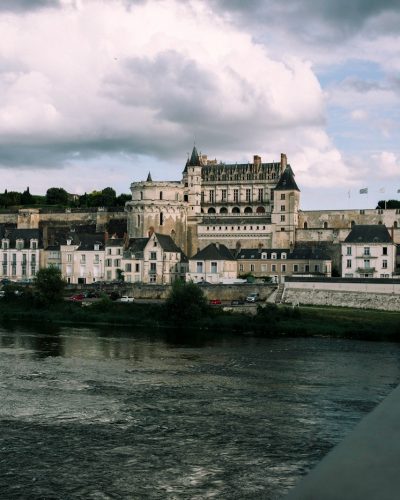A river running through a city next to a bridge