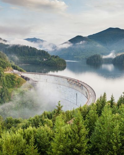 white bridge between mountains